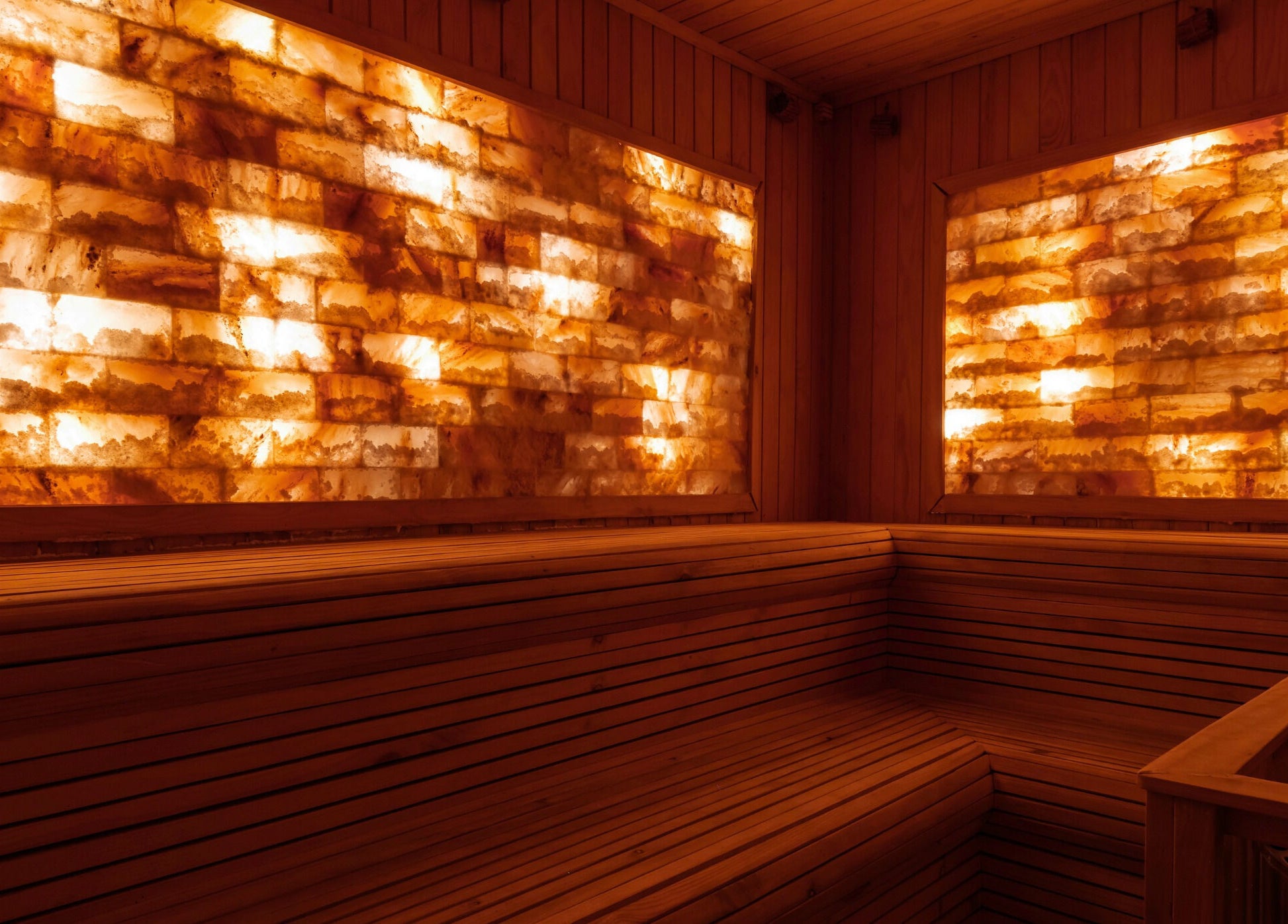 Warm salt brick sauna at NP Brows & Lashes x Ukiyo Spa, Ho Chi Minh, VN offering serene relaxation.