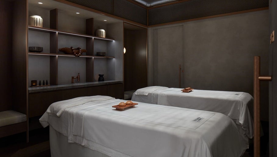 Luxurious spa room at SENSASIA Stories, Dubai, Dubai, AE with double massage tables and serene ambiance.