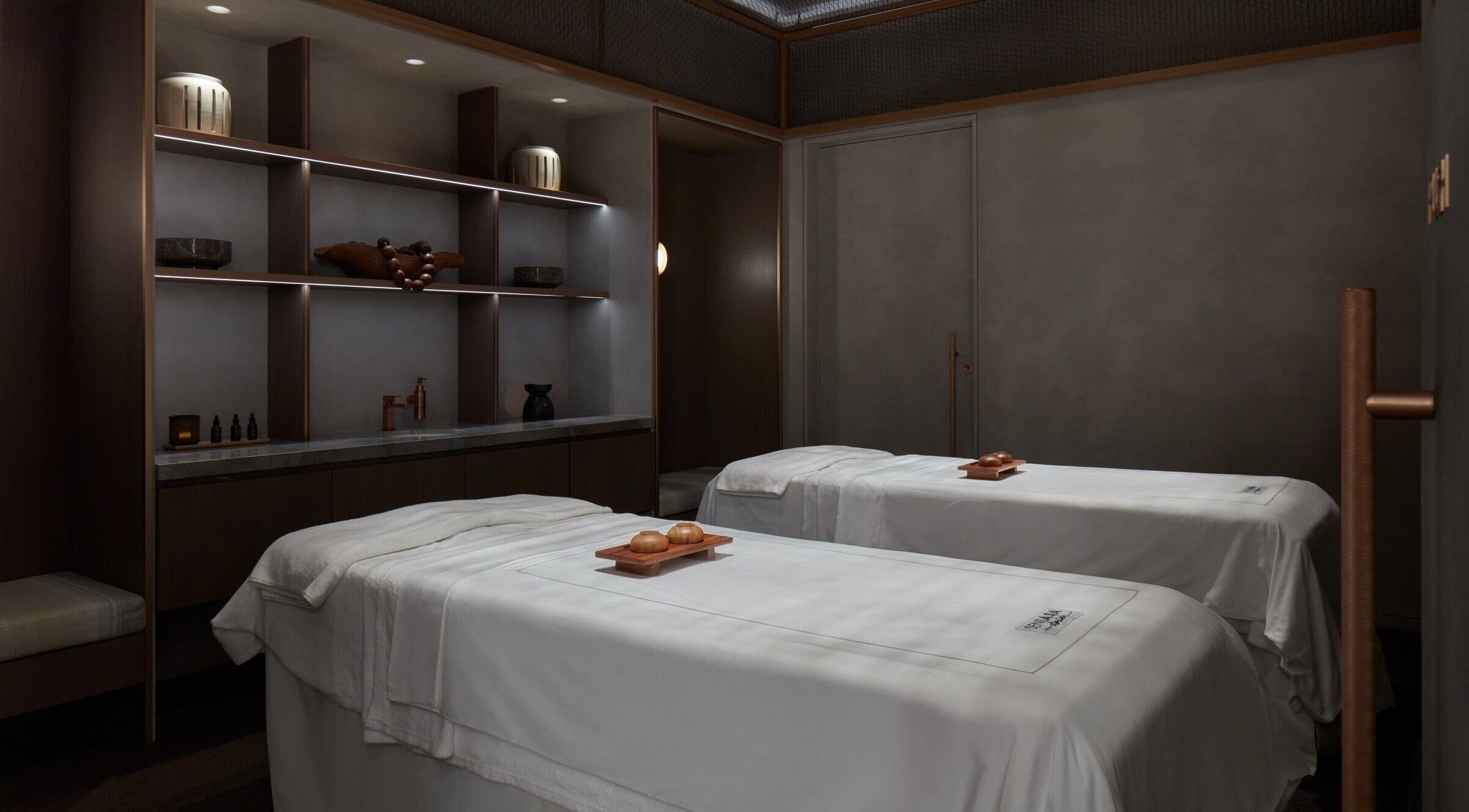 Luxurious spa room at SENSASIA Stories, Dubai, Dubai, AE with double massage tables and serene ambiance.