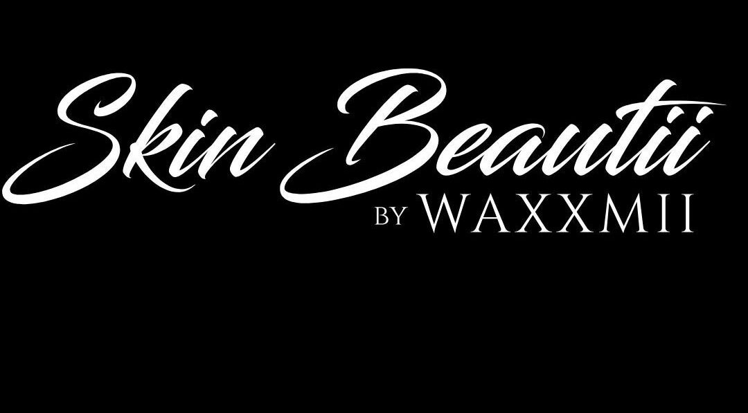 Skin Beautii by Robinson Rd logo in Nassau, New Providence, BS, featuring a sleek black and white design.