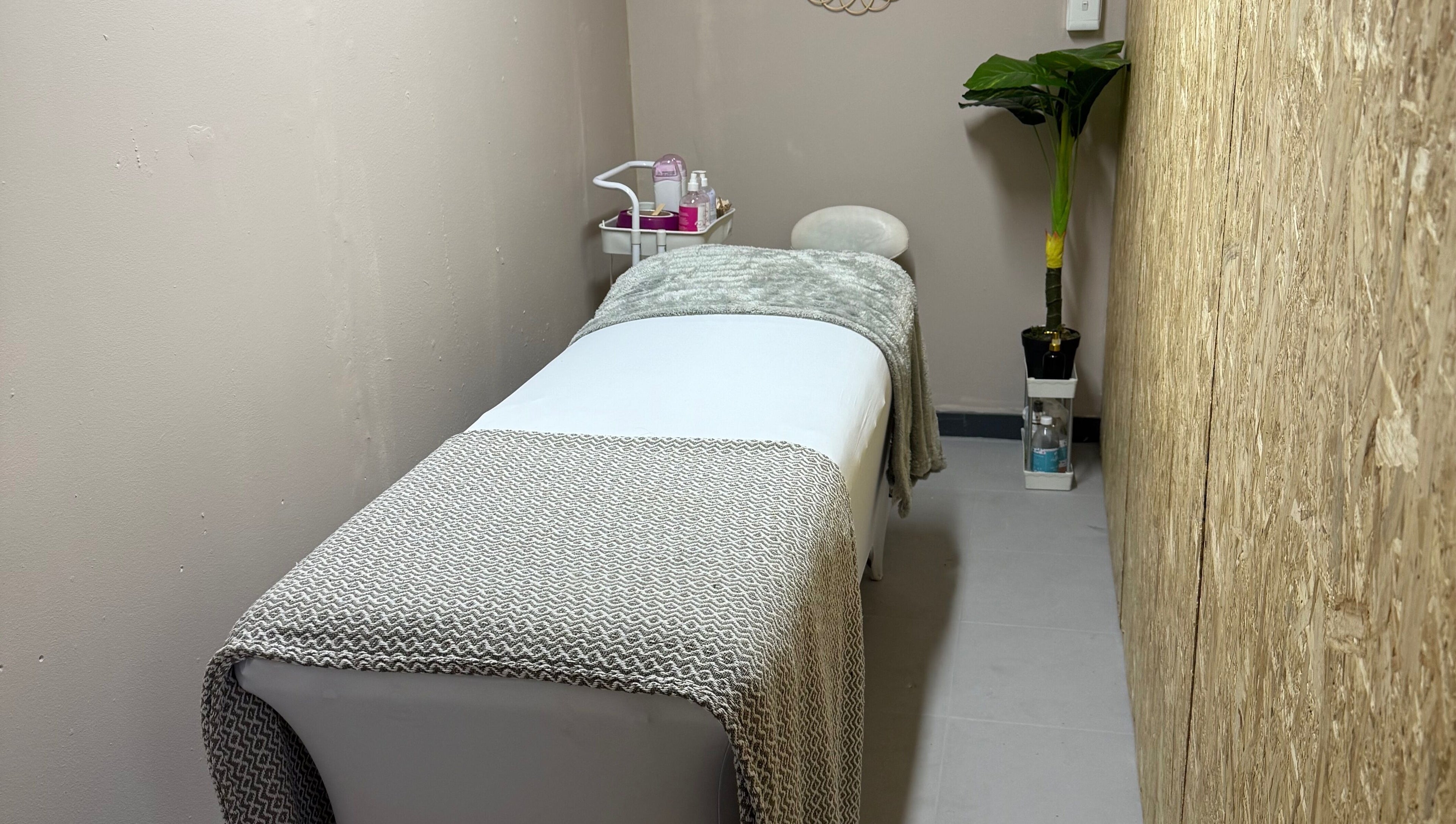 Peaceful massage room at Goddess Glow Pedi & Wax Bar, Cape Town, Western Cape, ZA, offering relaxation and comfort.
