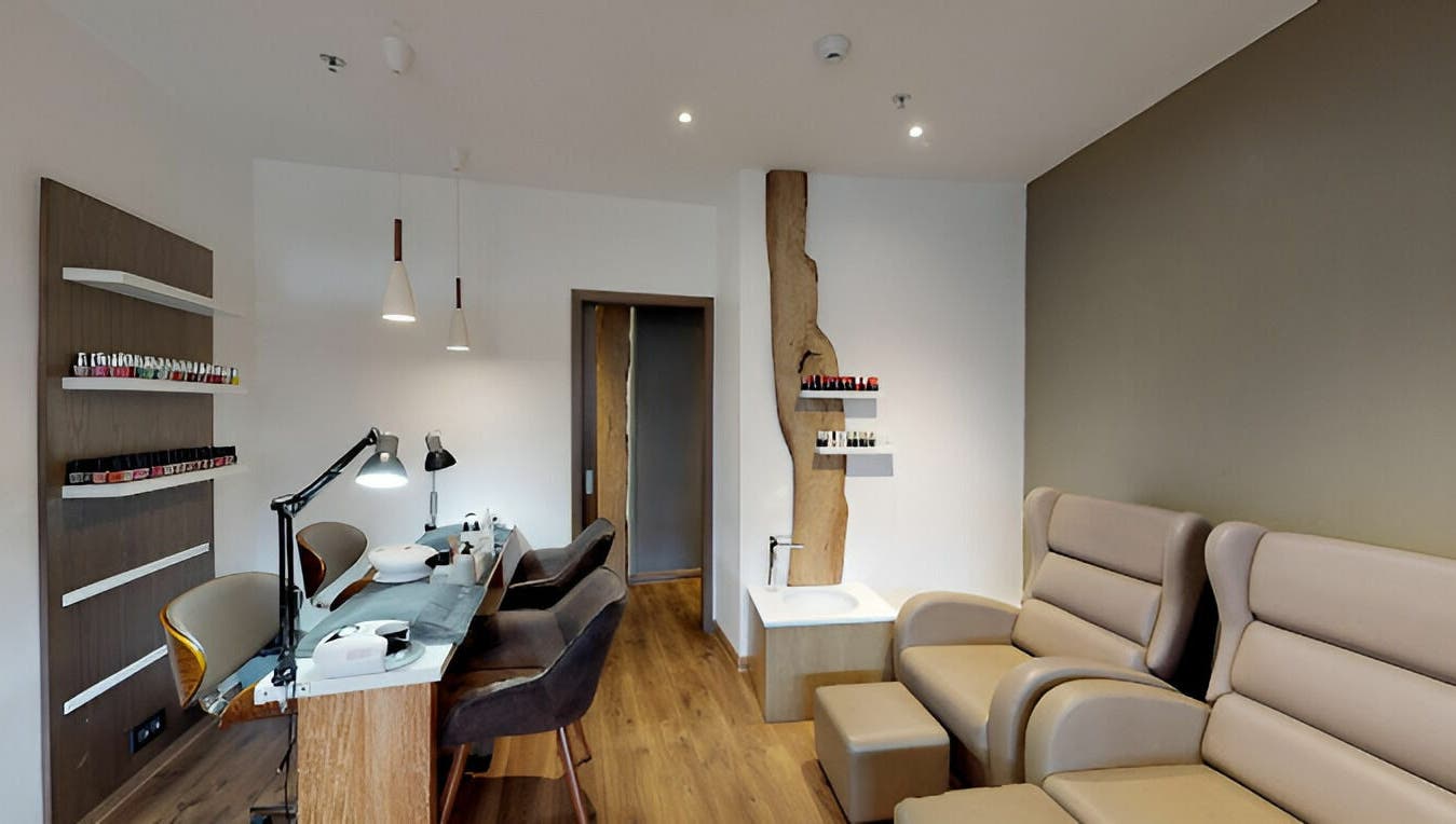 Chic nail salon space at MySpace Grand Bay, Grand Baie, Rivière du Rempart District, MU with modern seating and decor.