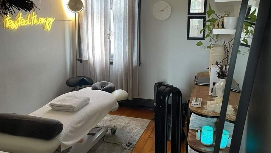 Peaceful therapy room at Tessted Therapy, Alexandria, New South Wales, AU with massage table and calming decor.