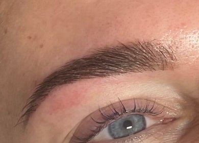 Perfectly groomed eyebrow showcasing beauty skills at The Glam and Glow Studio, Havant, England, GB.