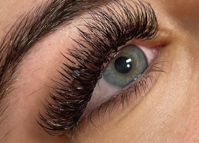 Close-up of enhanced eyelashes at The Glam and Glow Studio, Havant, England, GB, showcasing lash extension detail.