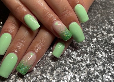 Mint green nails with glitter at The Glam and Glow Studio, Havant, England, GB.