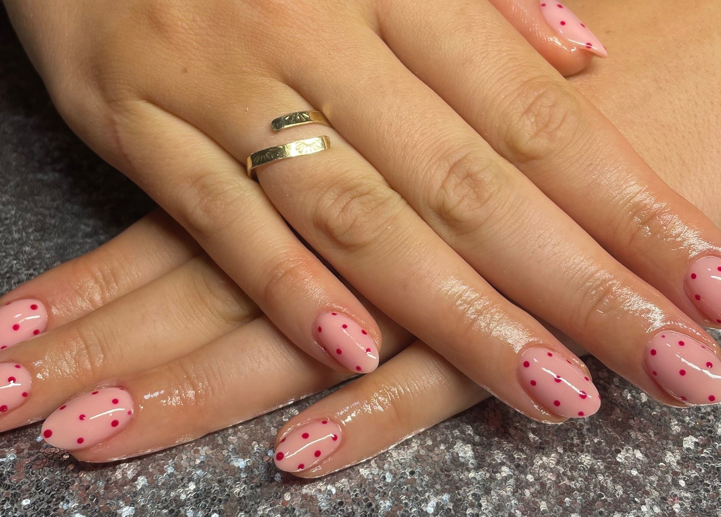 Pink polka dot nails at The Glam and Glow Studio, Havant, England, GB. Perfect for chic style.