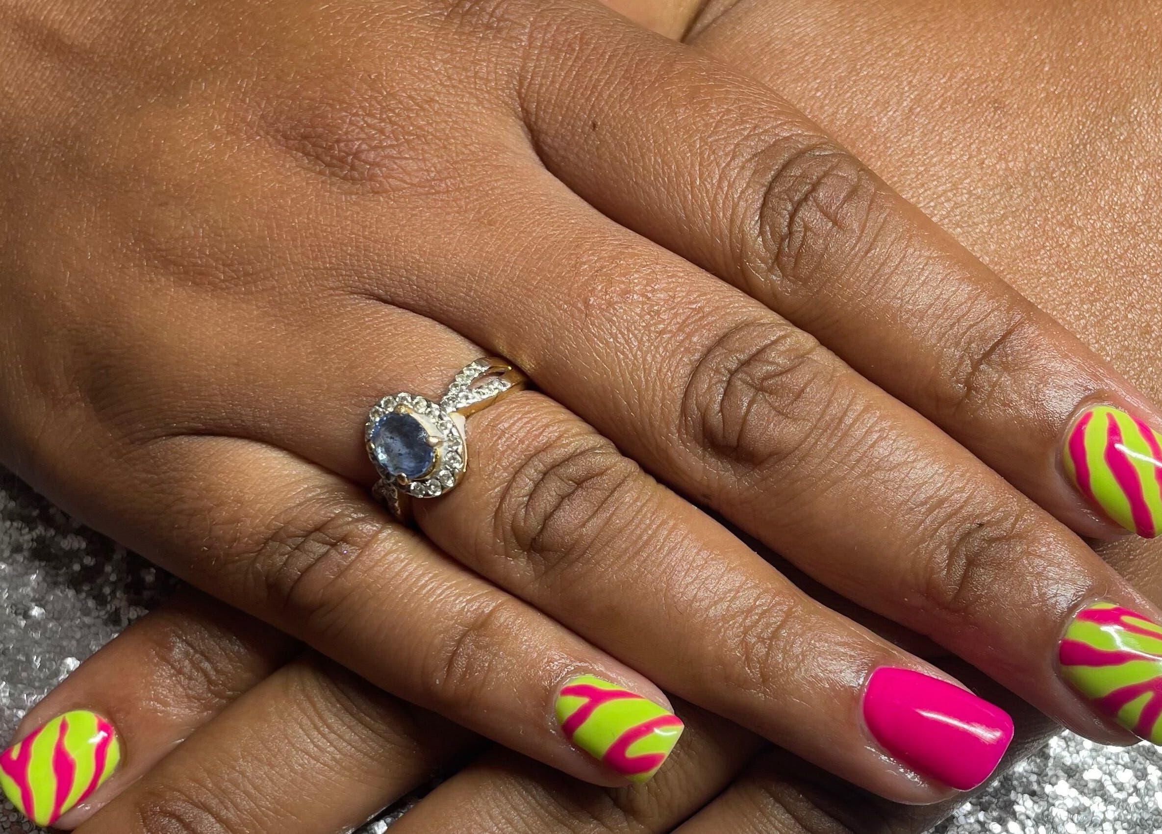 Vibrant pink and green nail art at The Glam and Glow Studio, Havant, England, GB.