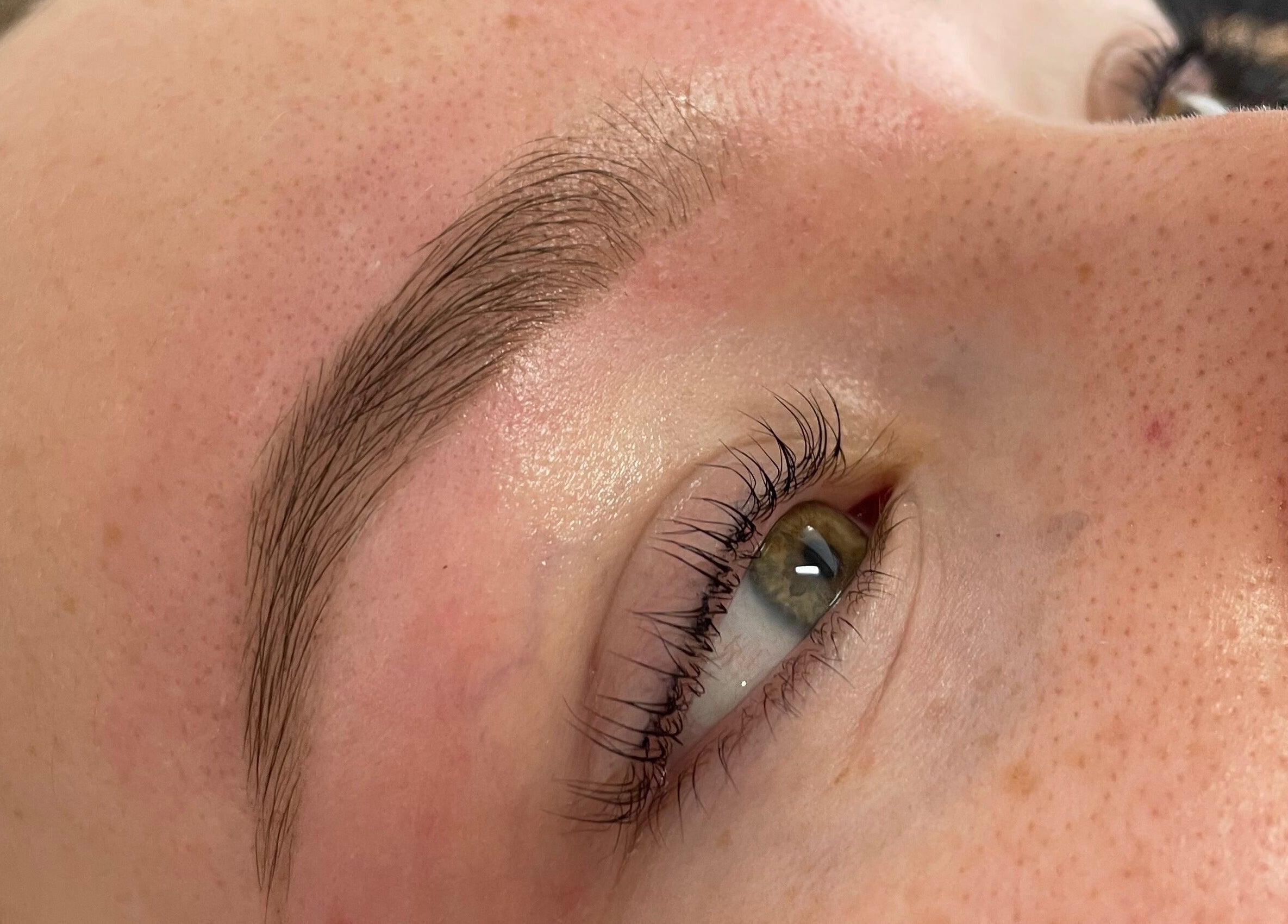 Close-up of perfectly shaped eyebrow at The Glam and Glow Studio, Havant, England, GB.
