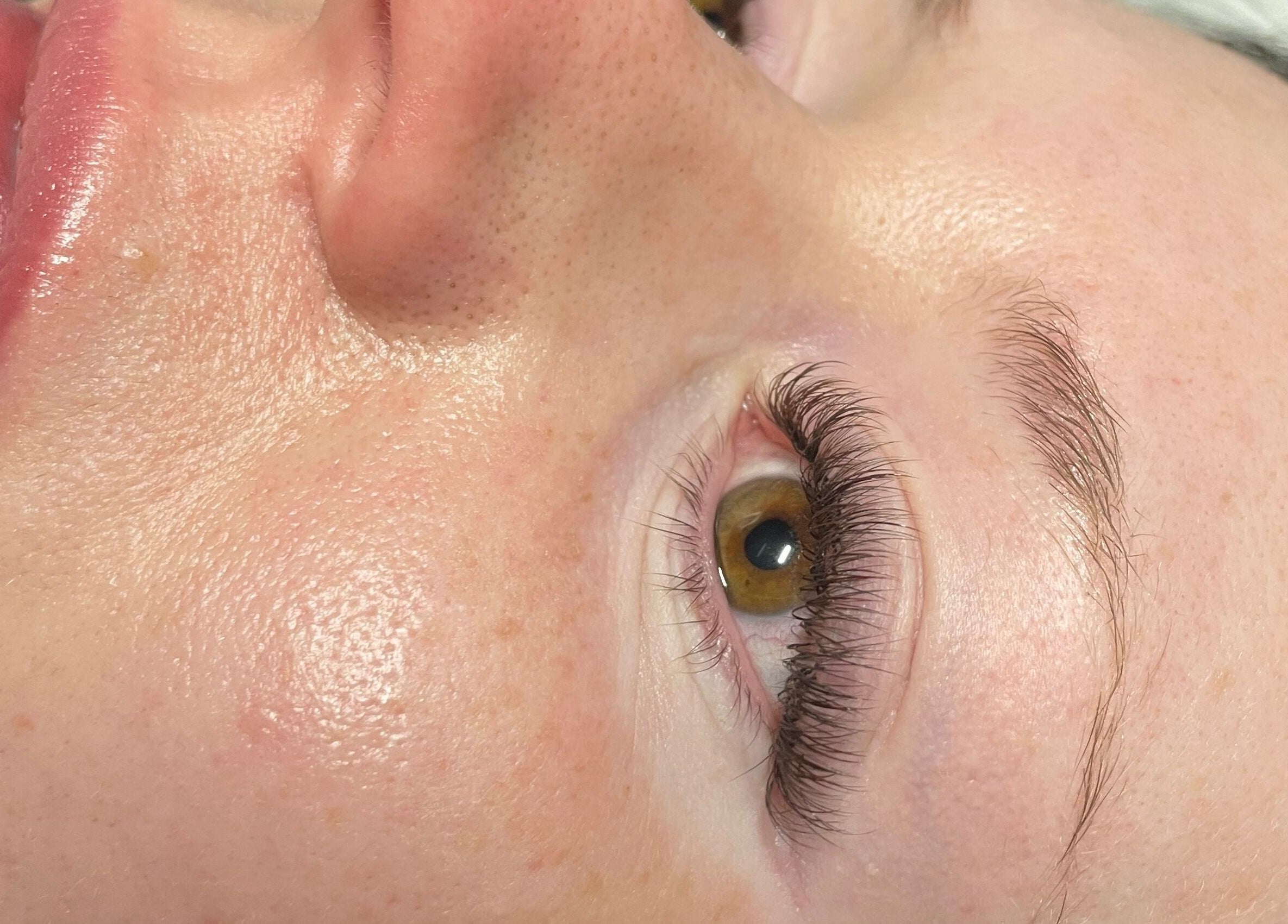 Close-up of eye with enhanced lashes at The Glam and Glow Studio in Havant, England, GB.
