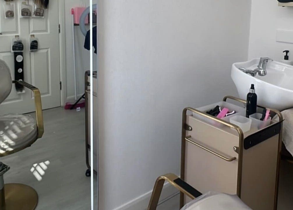 Stylish salon chair and wash station at Doll Hair By Lara in Leicester, England, GB.