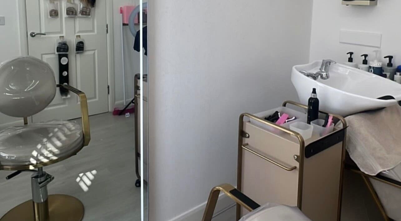 Stylish salon chair and wash station at Doll Hair By Lara in Leicester, England, GB.