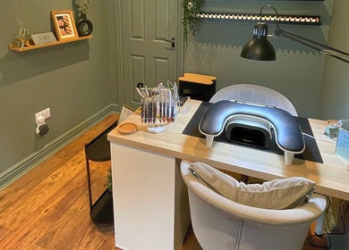 Nail station at CHELS xo NAILS - BIAB Gel Specialist, Yeovil, England, GB, featuring workspace and nail tools.