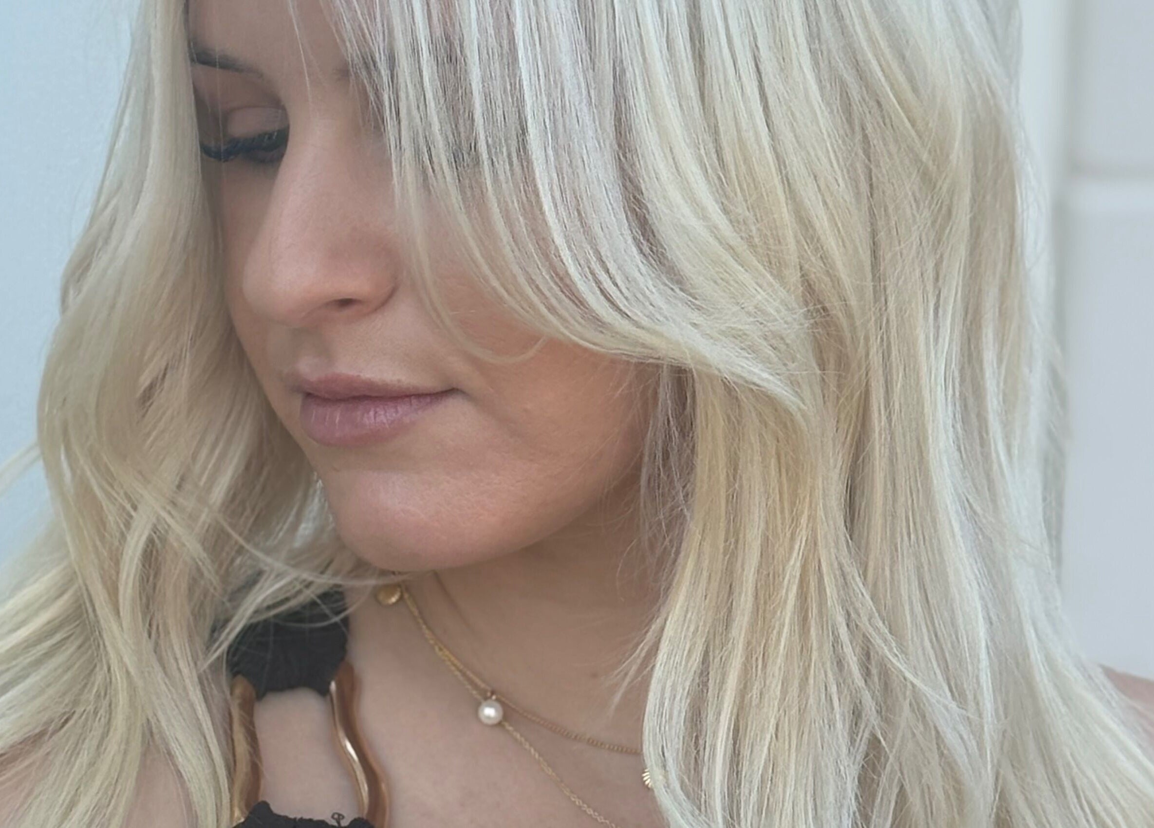 Blonde hairstyle at Blonde & Boujee Boutique, Tannum Sands, Queensland, AU. Sleek and chic look.