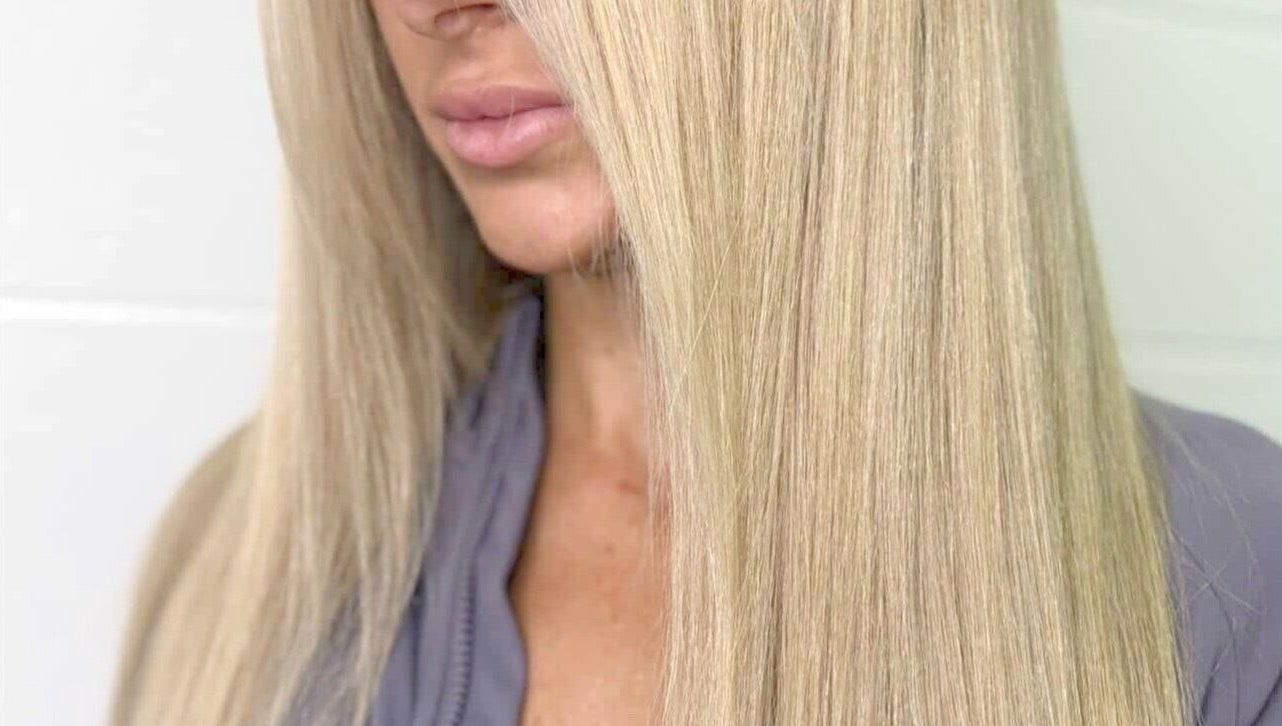Close-up of smooth, silky blonde hair styled at Blonde & Boujee- Tannum Sands, Queensland, AU.