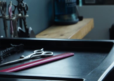 Hair styling tools neatly arranged on a tray at Nv Studio, Exeter, England, GB.