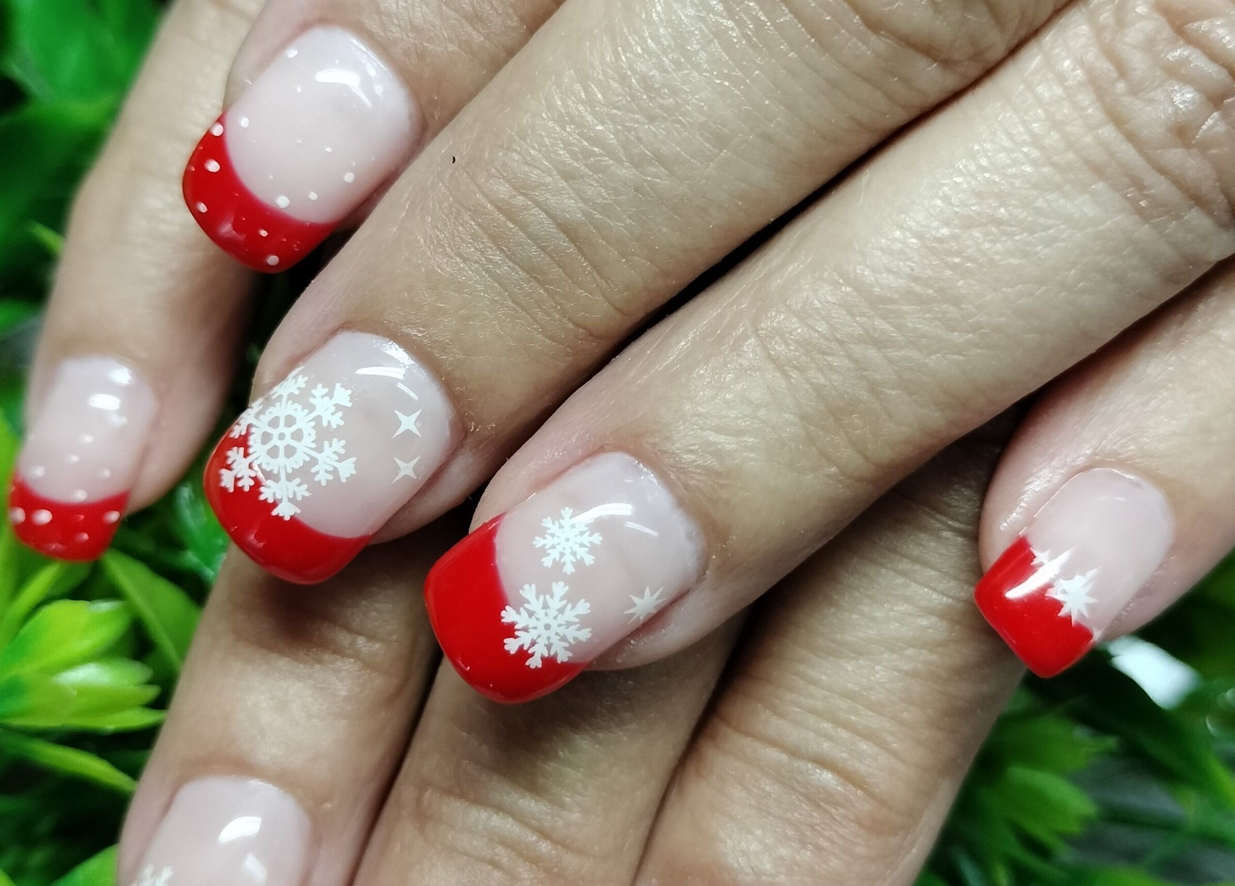 Festive red and white snowflake nail art at Beautify at Bella Mia, Potchefstroom, ZA.