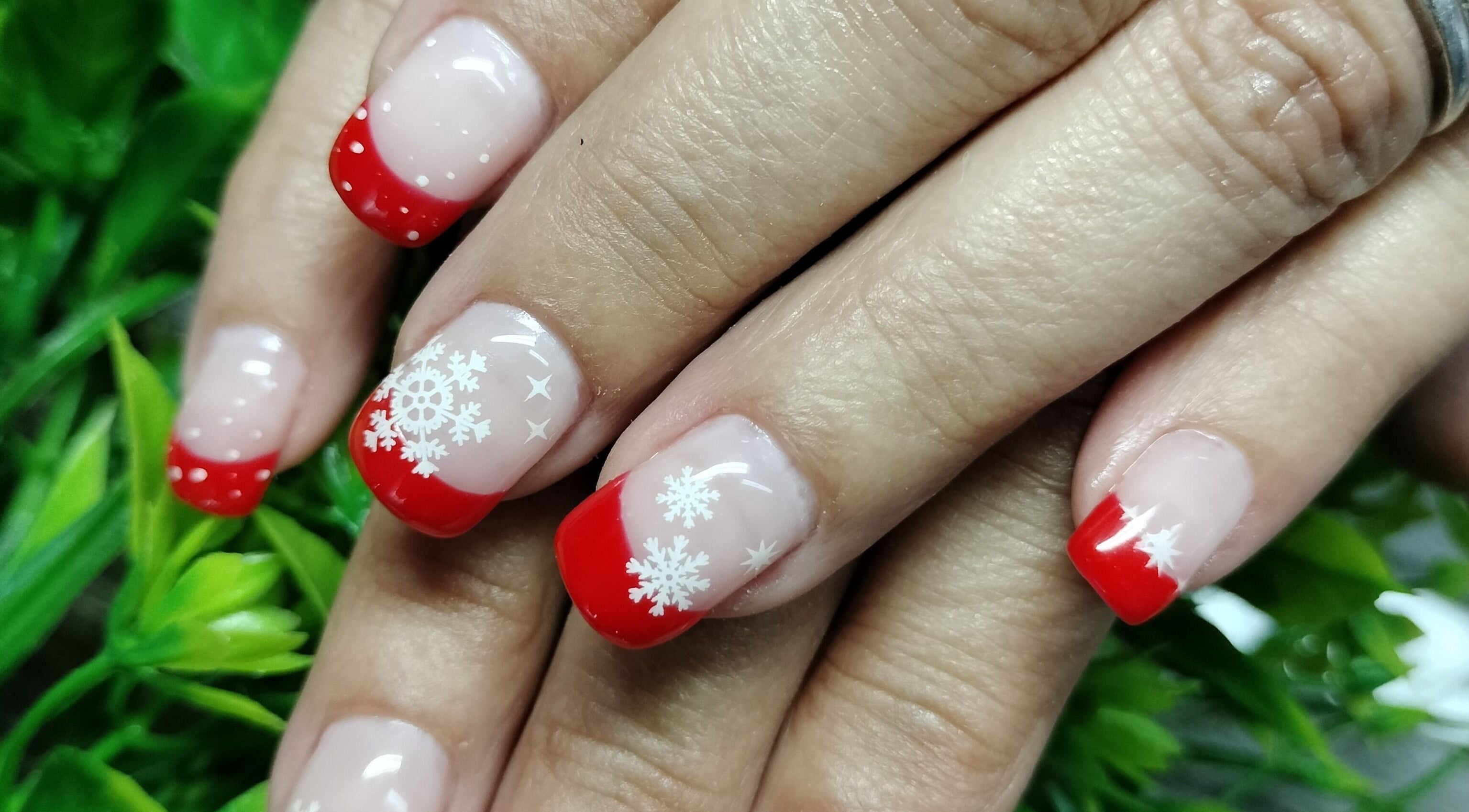 Festive red and white snowflake nail art at Beautify at Bella Mia, Potchefstroom, ZA.