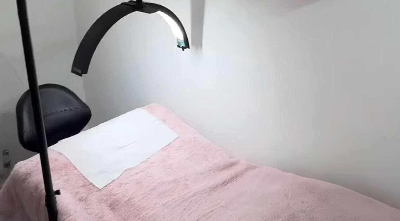 Cozy treatment bed in Hannah Coombs beauty, Brighton And Hove, England, GB, ready for clients.