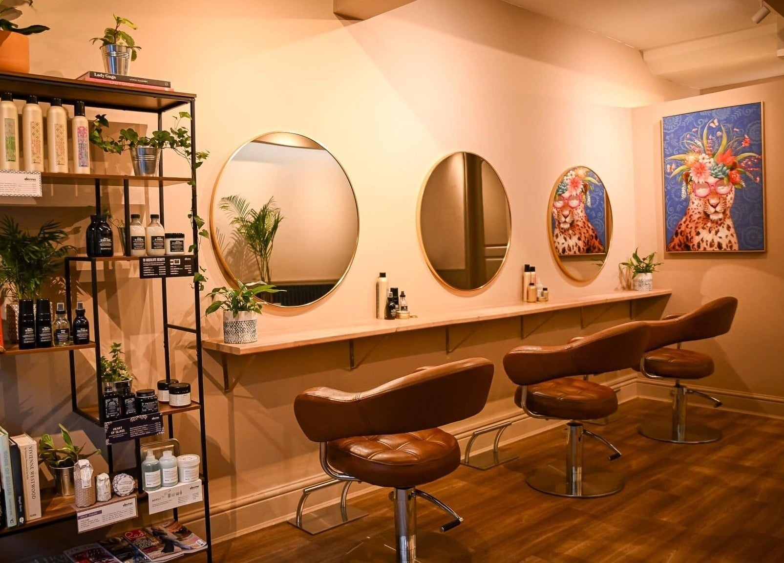 Stylish salon interior at Forté, Louth, England, GB with mirrors and products.