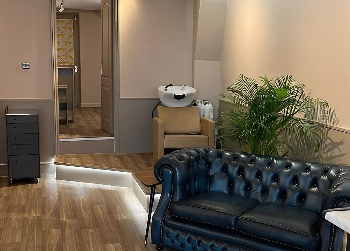 Inviting seating area in Forté, Louth, England, GB with plush couch and modern decor.