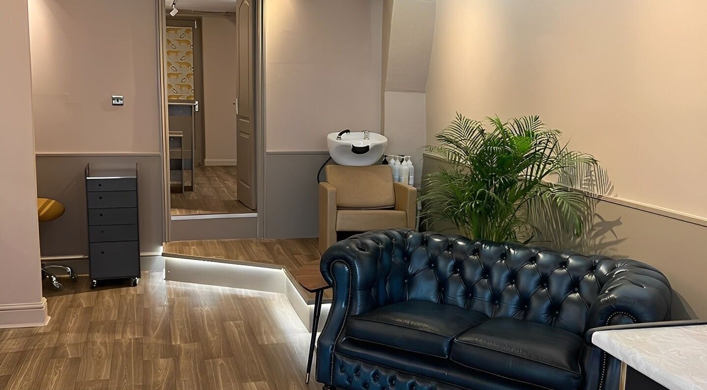 Inviting seating area in Forté, Louth, England, GB with plush couch and modern decor.