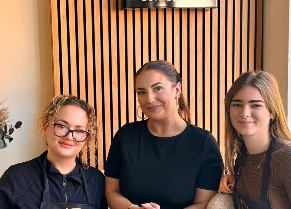 Team at Lux Beauty in Cannock, England, GB welcoming guests with warm smiles and inviting decor.