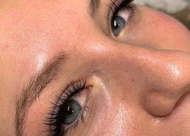 Close-up of perfectly groomed eyebrows and eyelashes at Her Heaven, Cape Town, Western Cape, ZA.