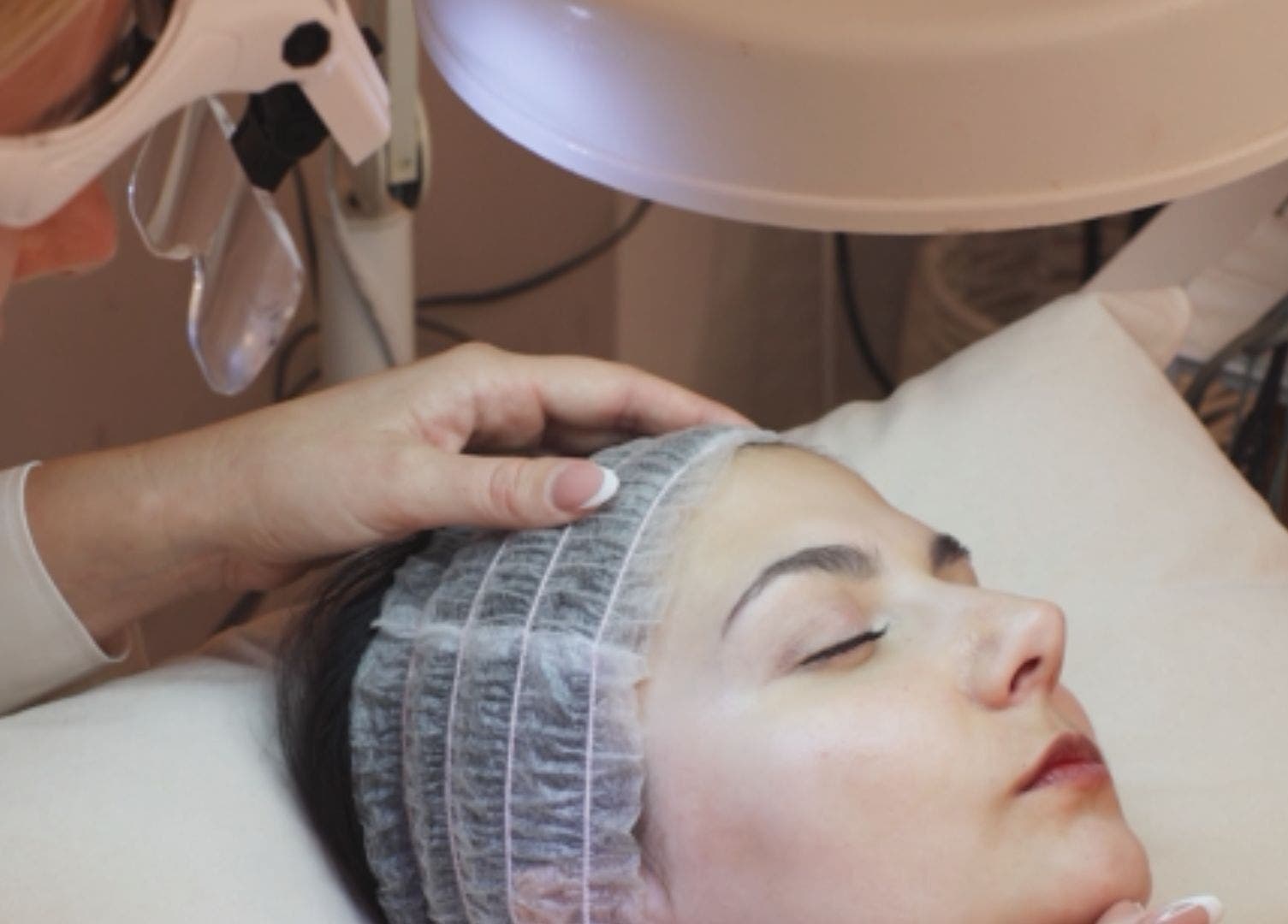 Facial treatment at Fountain of Youth, Ħal Balzan, MT. A professional beautician provides rejuvenating care.