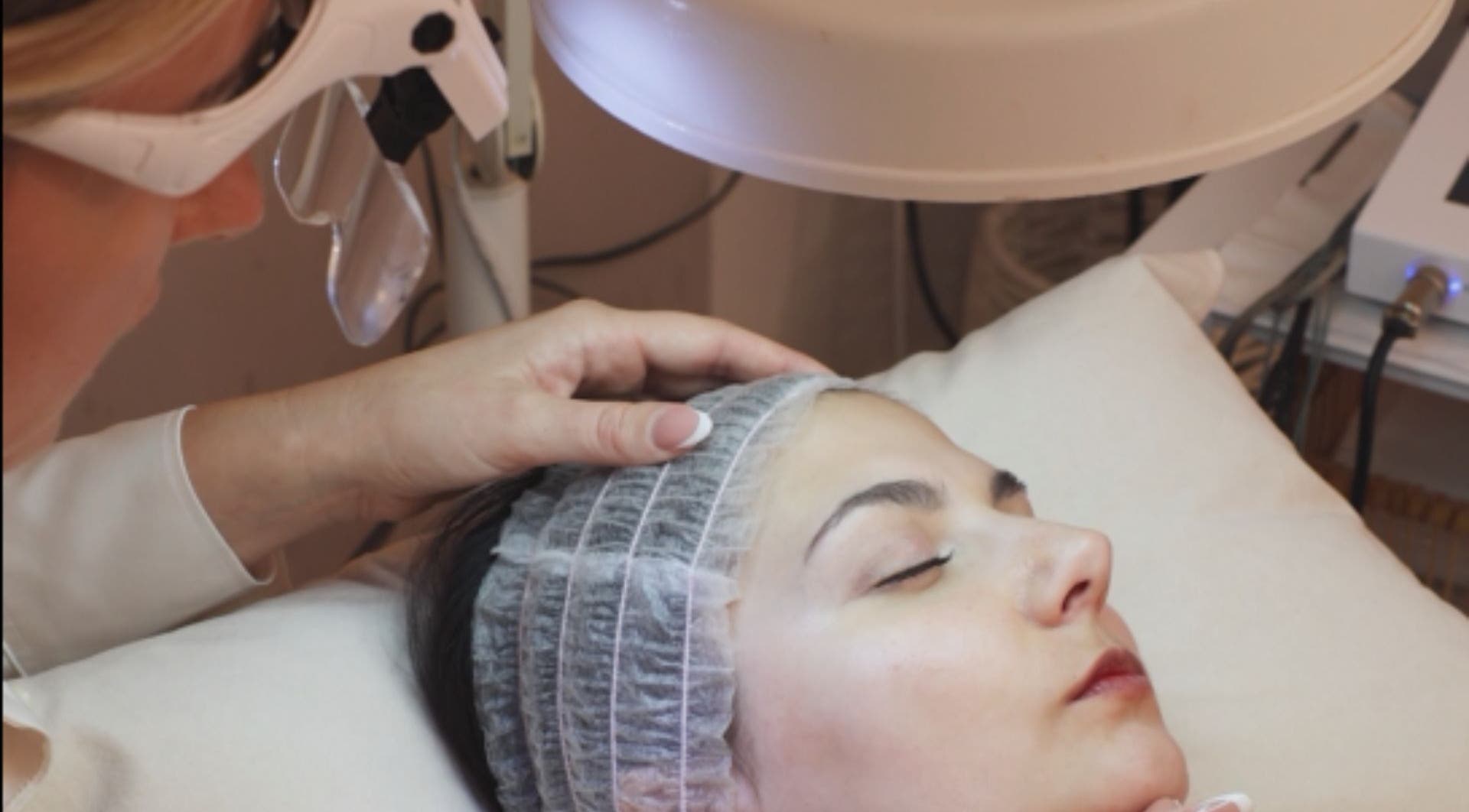 Facial treatment at Fountain of Youth, Ħal Balzan, MT. A professional beautician provides rejuvenating care.