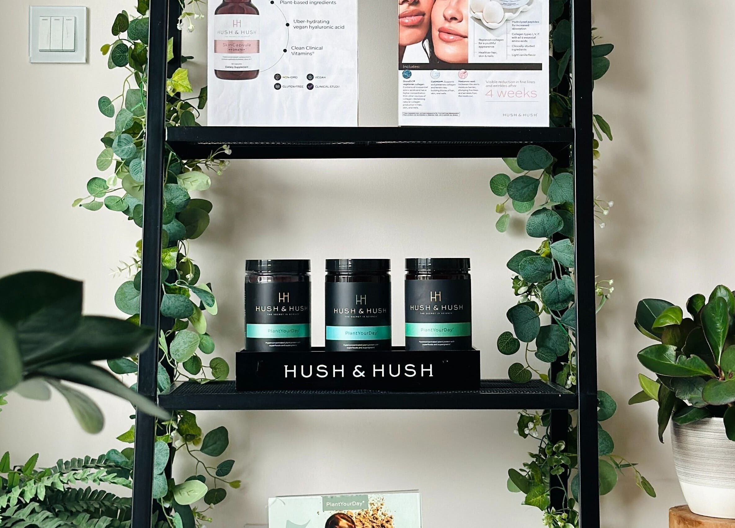 Shelves with Hush & Hush products adorned with plants at Fountain of Youth, Ħal Balzan, MT.