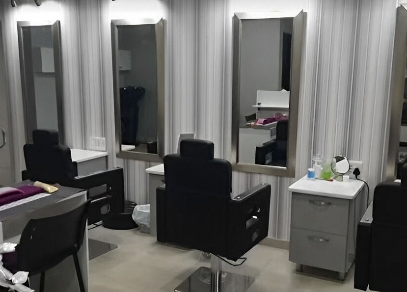 Modern salon interior with mirrors and chairs at Roop Beauty and Threading, Centurion, Gauteng, ZA.