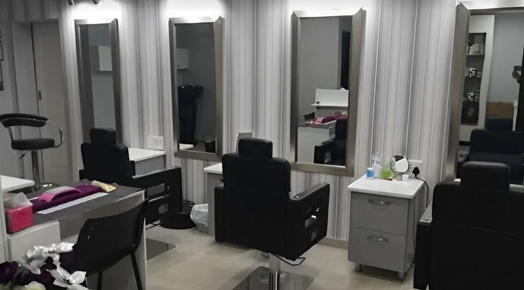 Modern salon interior with mirrors and chairs at Roop Beauty and Threading, Centurion, Gauteng, ZA.
