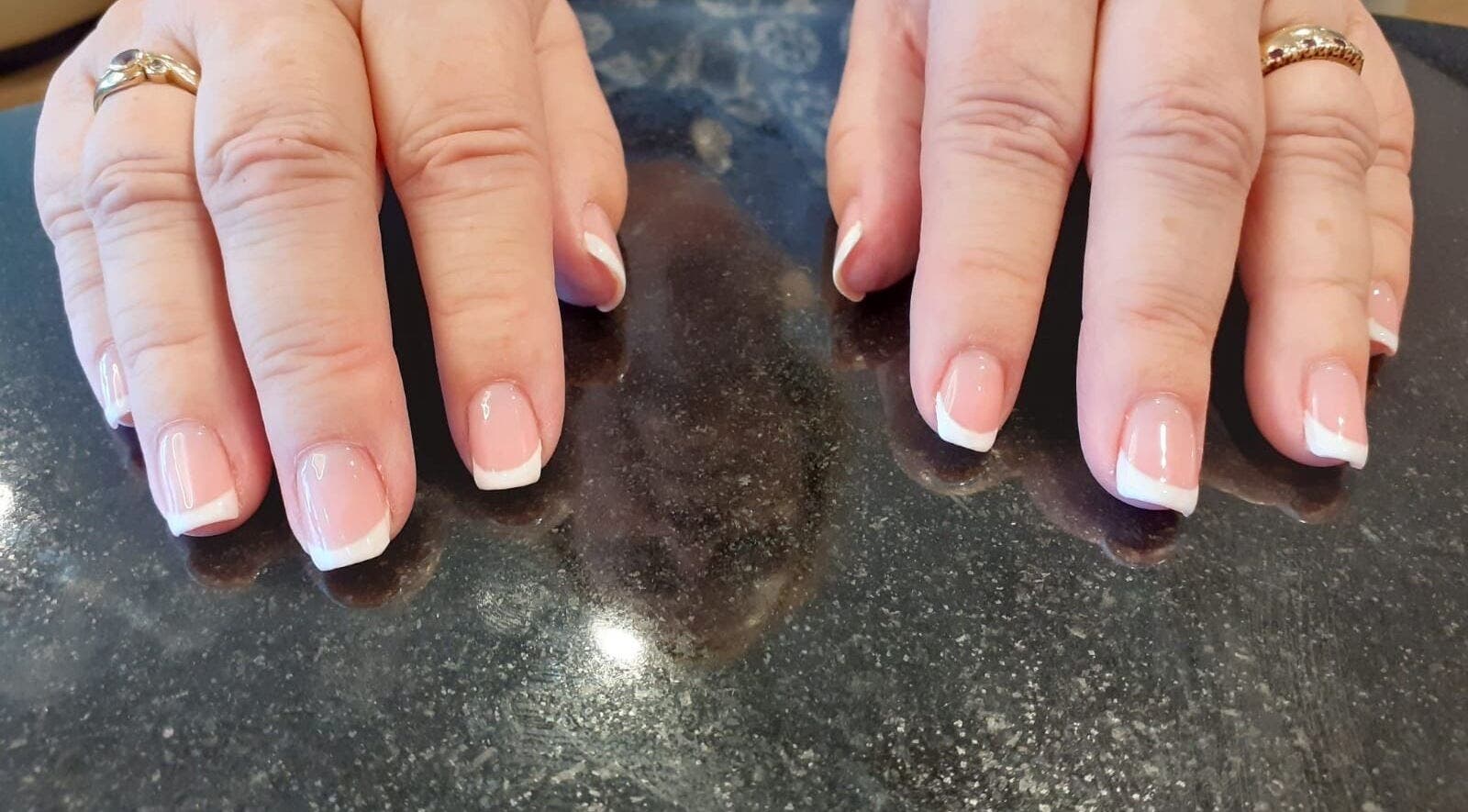 French manicure at Luce Nails, Chadwell St Mary, England, GB. Elegant and polished look.