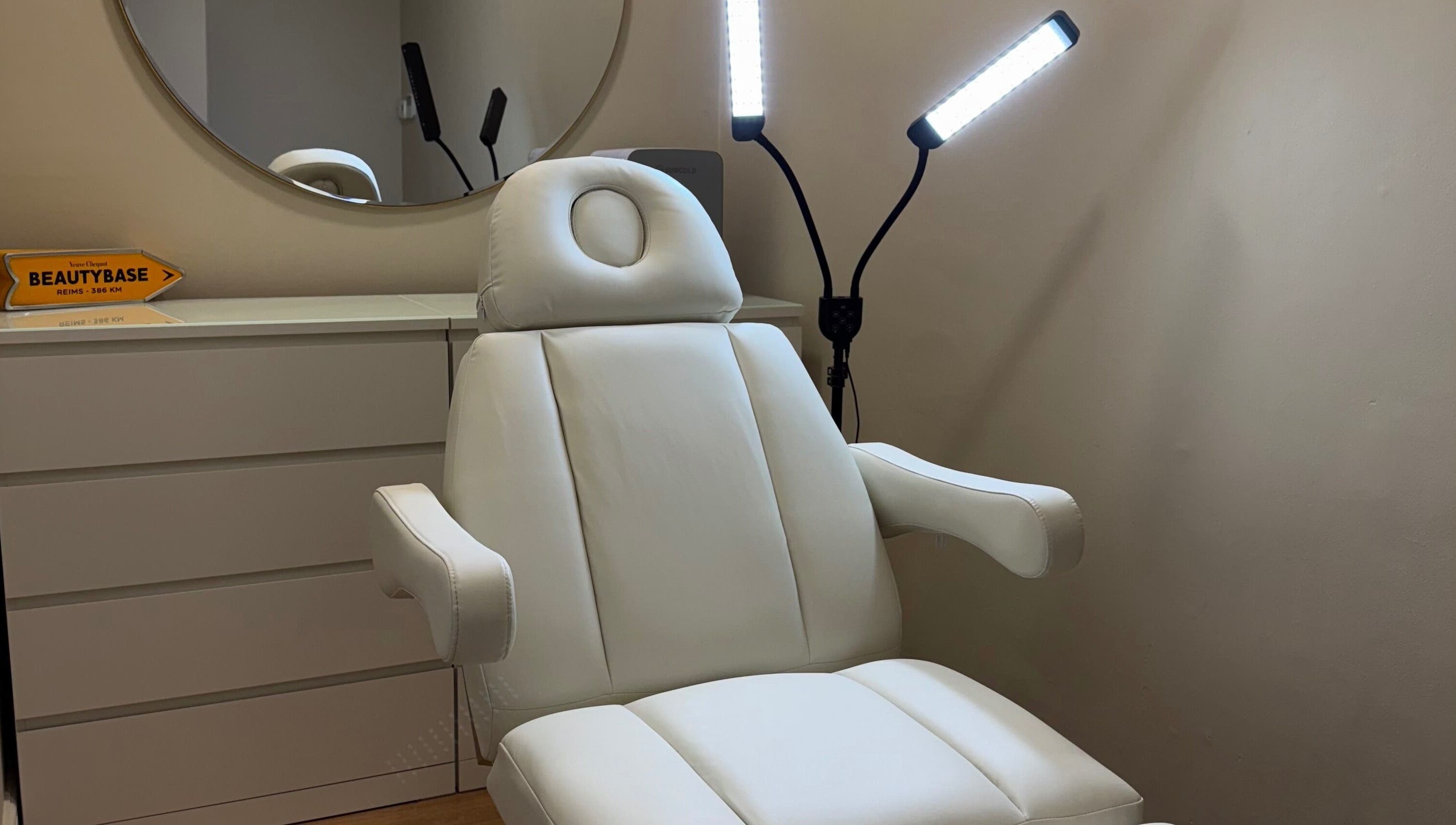 Modern treatment chair at Quinns Tanning and Aesthetics in London, England, GB, showcasing a serene environment.