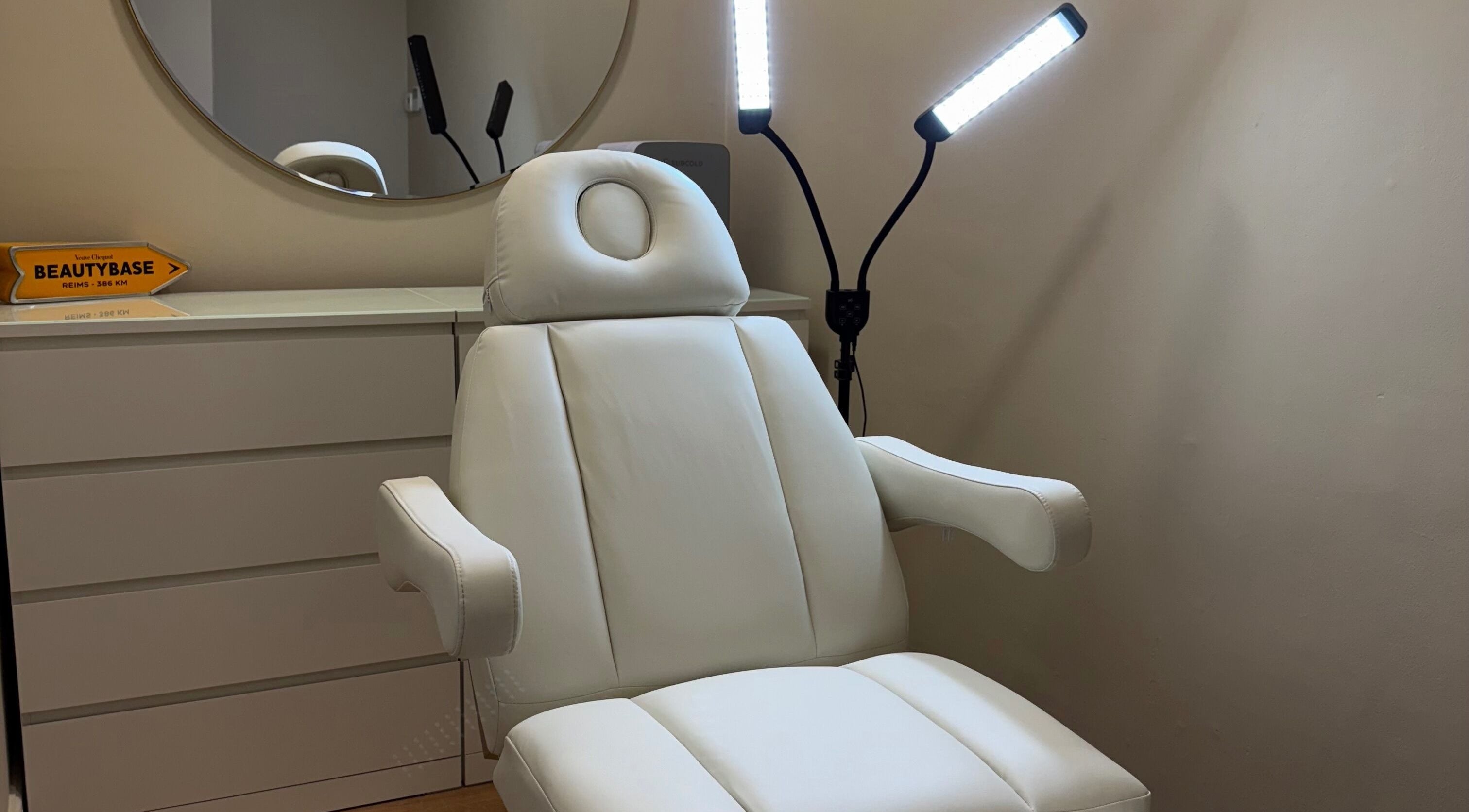 Modern treatment chair at Quinns Tanning and Aesthetics in London, England, GB, showcasing a serene environment.