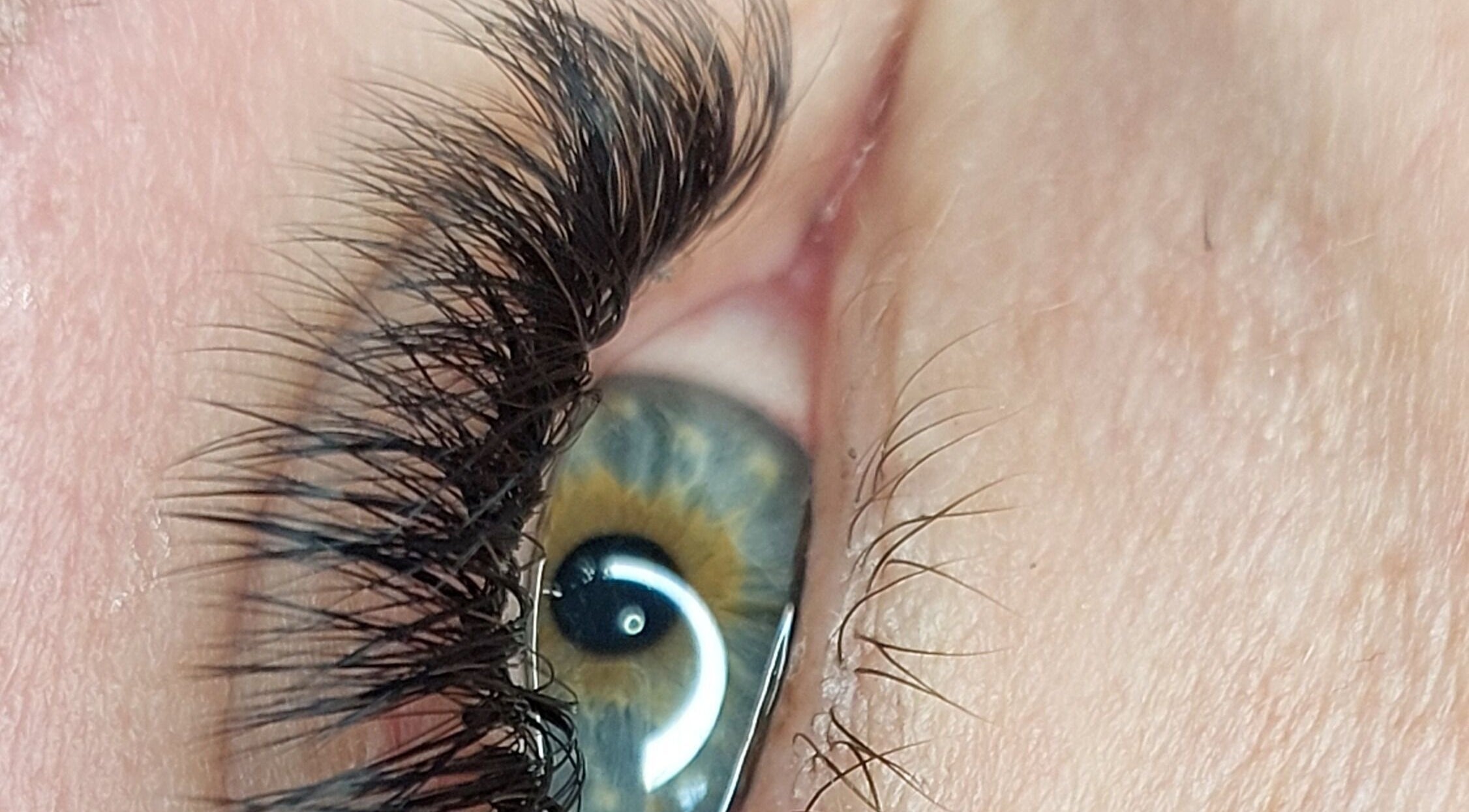 Close-up of expertly applied eyelash extensions at Lashous Beauty Studio, Benoni, Gauteng, ZA.