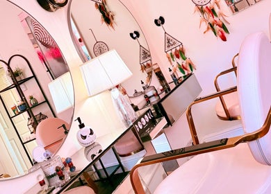 Elegant boho-style salon interior at Namastique, Hull, England, GB, featuring chic decor and plush seating.