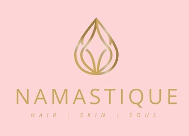Namastique logo featuring elegant design in pink backdrop, Hull, England, GB.