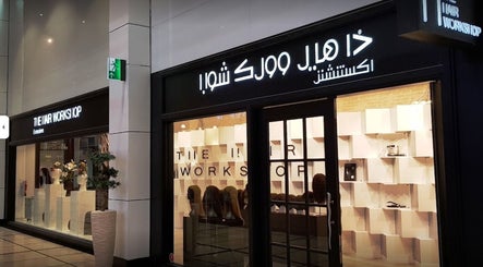 The Hair Workshop Extensions Hair Couture storefront in Dubai, Dubai, AE, showcasing chic interior design.
