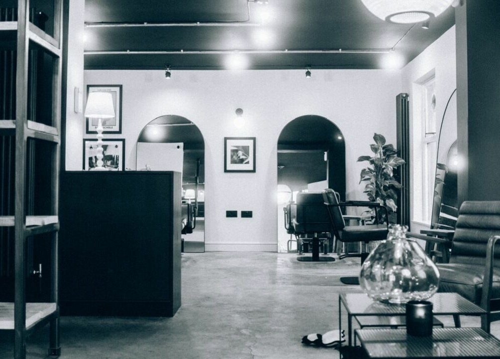 Stylish interior of Blake Edwards salon in Leicester, England, GB featuring chic decor and modern seating.