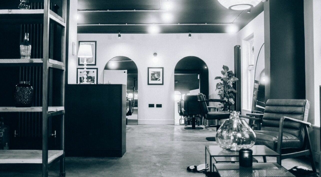 Stylish interior of Blake Edwards salon in Leicester, England, GB featuring chic decor and modern seating.