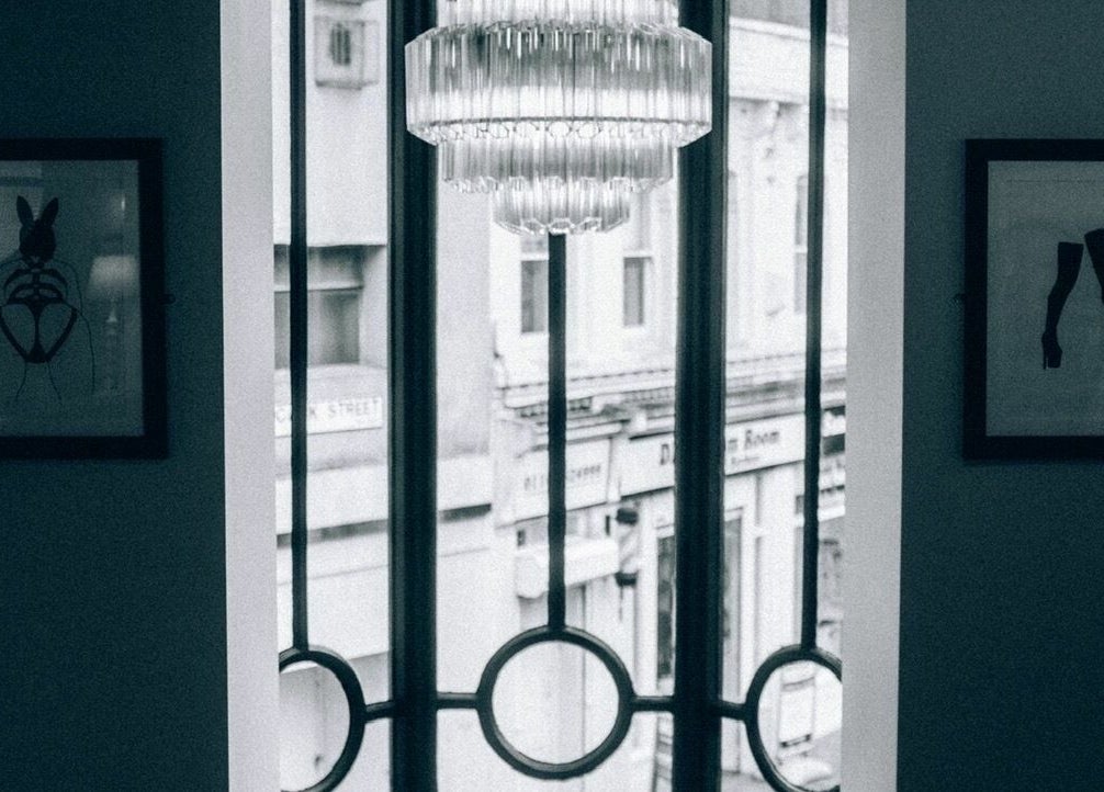 Elegant chandelier and art at Blake Edwards, Leicester, England, GB, showcasing a refined ambiance