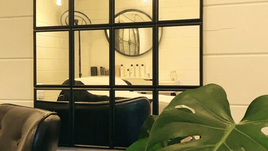 Elegant mirrors and chic chairs at Bombshell Boutique Beauty, Bracknell, England, GB.