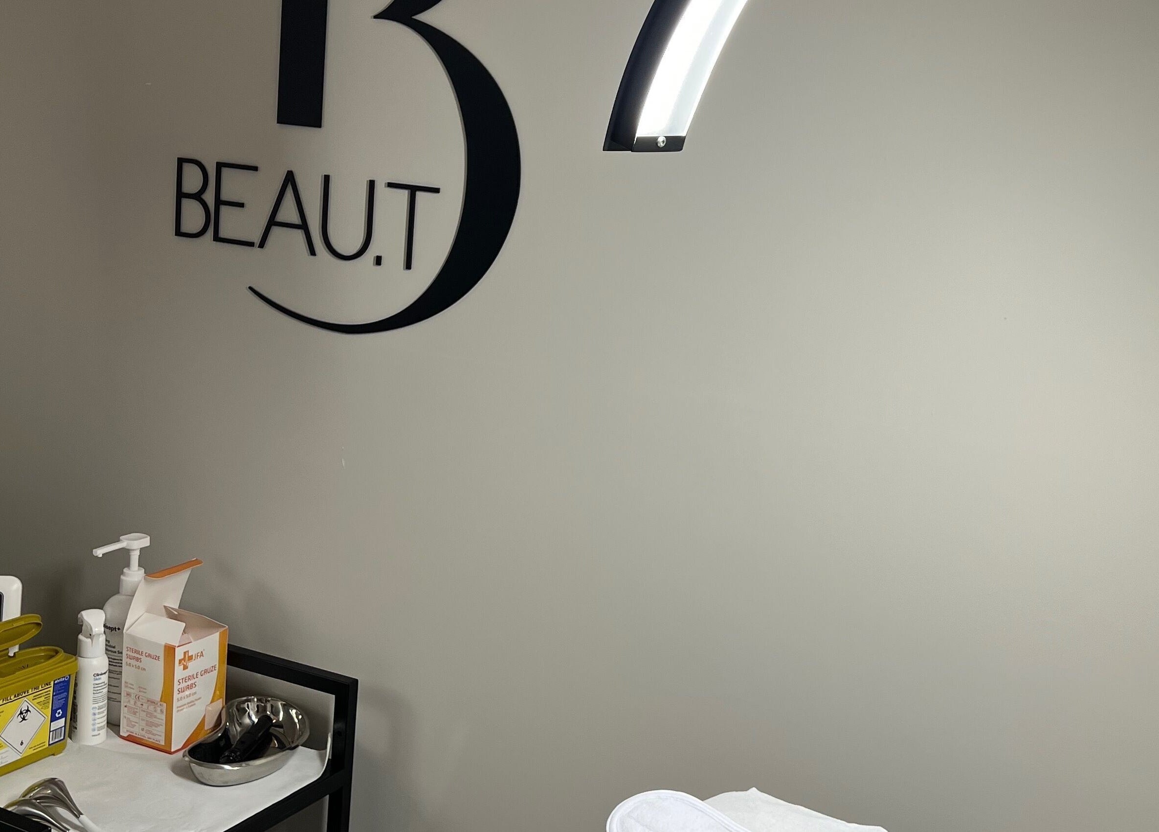 Beau.t treatment room in Southwater, England, GB with essential beauty supplies neatly arranged.