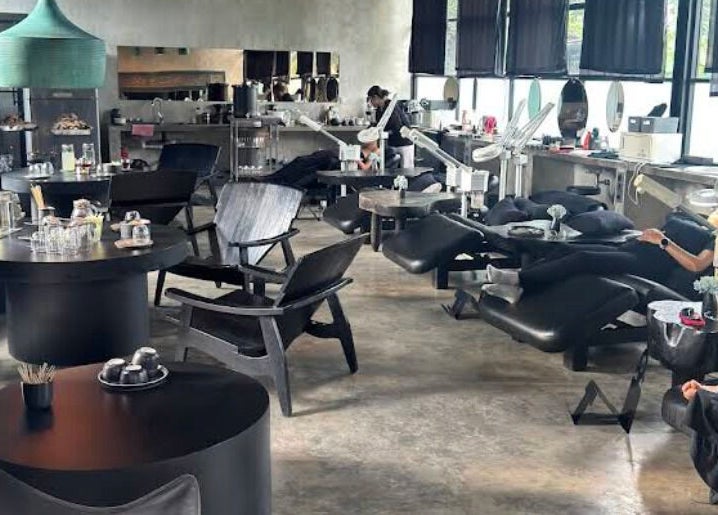 Relaxing interior at Muka Concepts Jalan Green School, Sibang Kaja, Bali, ID with modern spa chairs and decor.