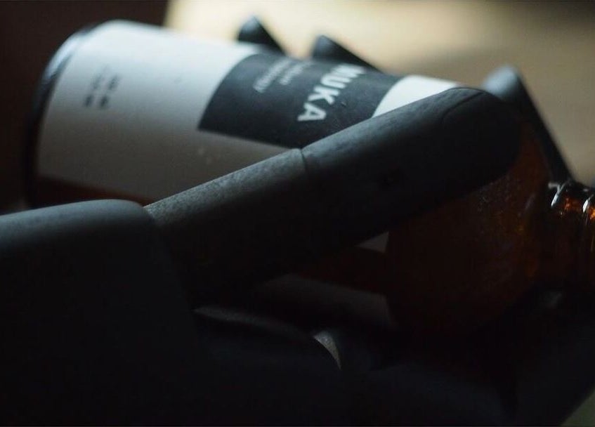 Close-up of a skincare bottle at Muka Concepts Jalan Green School, Sibang Kaja, Bali, ID.