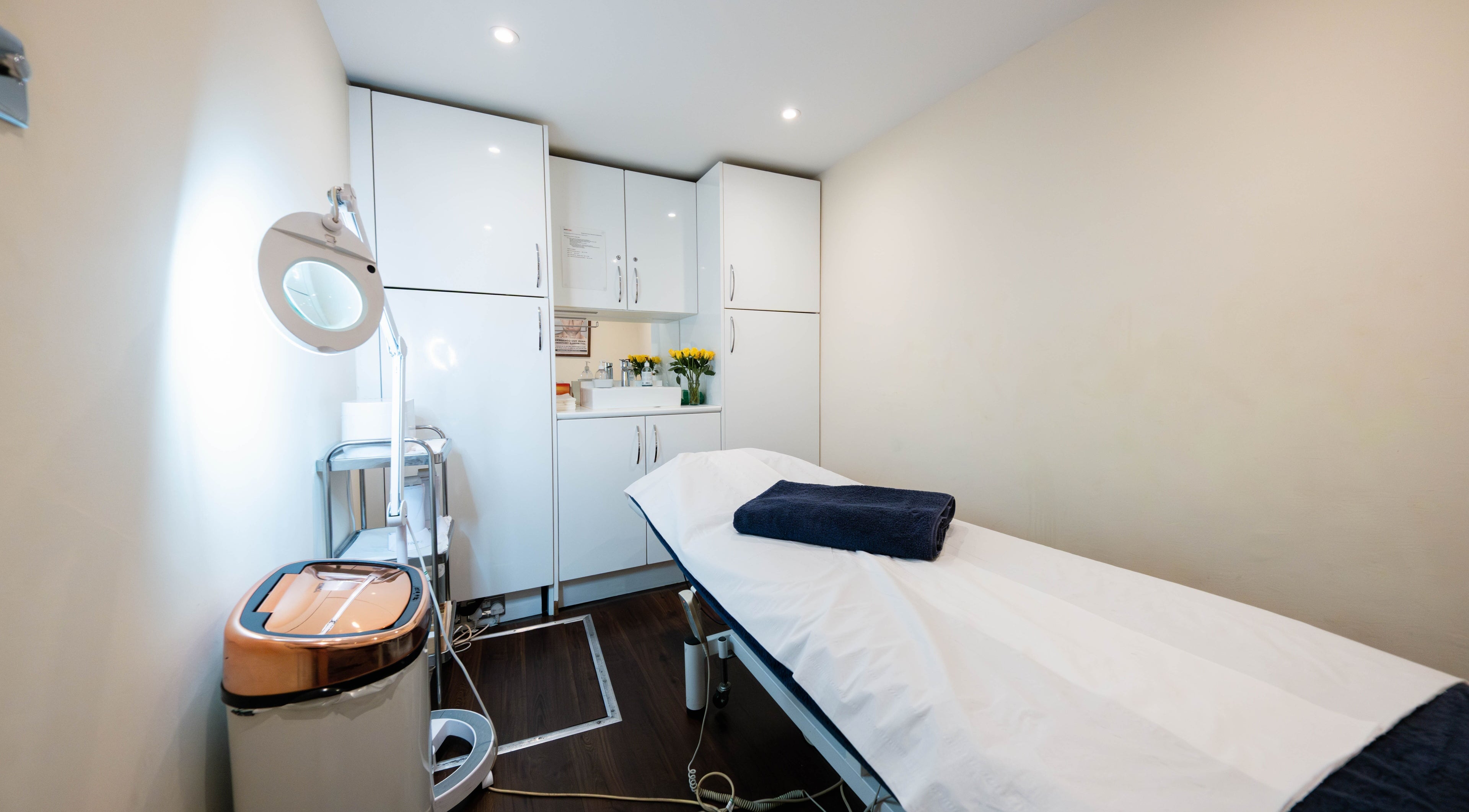 Relaxing treatment room at Soho Beauty Treatments in London, England, GB, featuring a comfortable treatment bed.