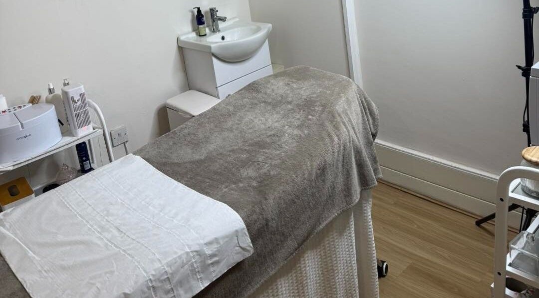 Cozy treatment room at Blush Beauty Suite, Yeadon, England, GB. Features a comfortable bed and stylish decor.