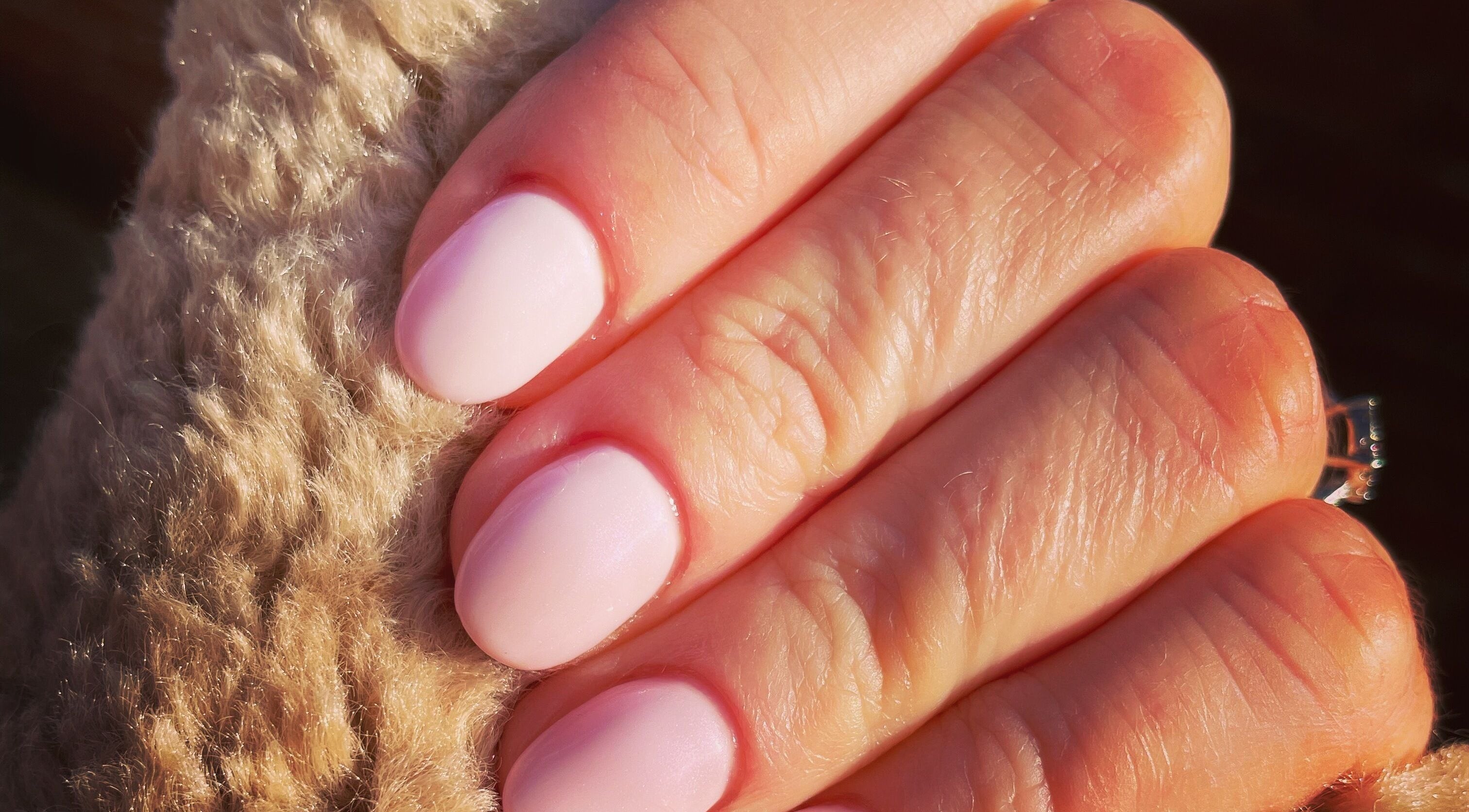 Close-up of pink manicured nails at Fabulash, Stonehouse, England, GB.